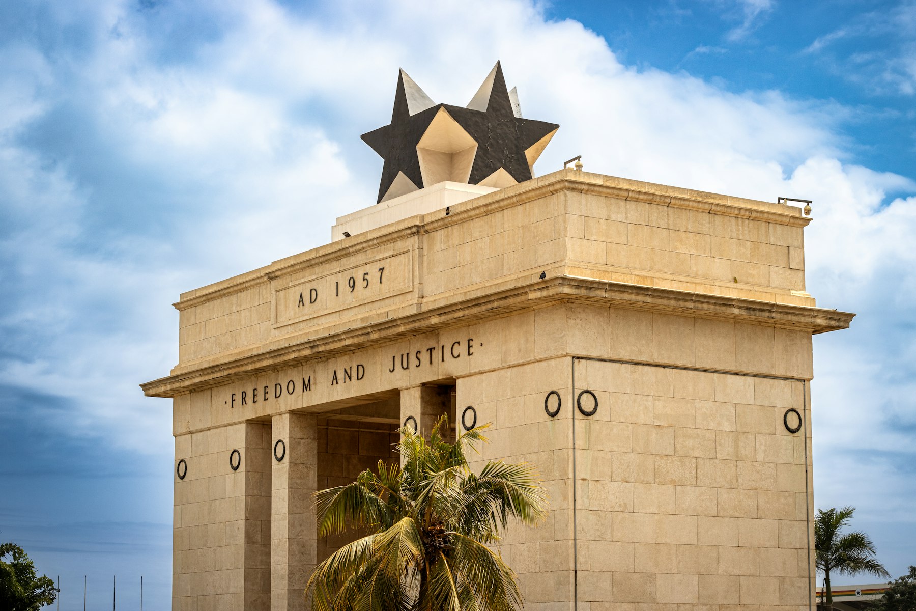 The Black Star Gate at Independence Square, Accra, under a bright sky